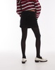 Topshop denim mini pelmet skirt in black cord