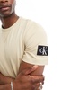Calvin Klein Jeans badge logo t-shirt in beige