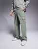 ASOS DESIGN wide leg smart pants in green with cargo pockets