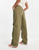 Bershka baggy parachute tech pants in khaki