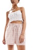 ASOS DESIGN shorts with ruffle detail in pink gingham