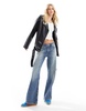 ASOS DESIGN Tall longline oversized faux leather biker jacket in black