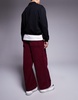 ASOS DESIGN super baggy cord pants in burgundy