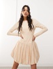 Amy Lynn scoop back allover lace mini dress with bubble hem in milk