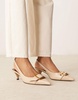 ASOS DESIGN Stellar buckle detail kitten heels in beige