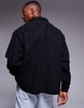 ASOS DESIGN oversized boxy shirt with patch pockets in black