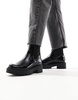 Stradivarius flat ankle boot in black