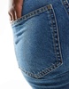 ASOS DESIGN mid rise straight jeans in mid blue