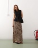 Weekday Ibis asymmetric peplum top with concealed buttons in black