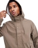 ASOS DESIGN rubberized rain jacket in mushroom