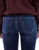 Bershka Petite high rise flared jeans in dark wash