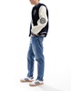 ASOS DESIGN tapered jeans in tinted dark wash blue