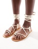 ASOS DESIGN Finland leather strappy toe-loop flat sandals in gold