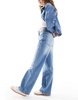 Bershka high rise 90s wide leg jeans in light washed blue