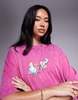 ASOS DESIGN Disney unisex oversized t-shirt with Alice in Wonderland prints in washed pink
