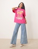 ASOS DESIGN oversized T-shirt with Holland floral graphic in pink