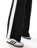 ASOS DESIGN Petite pull-on pants with contrast panel in black