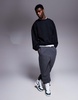 ASOS DESIGN heavyweight boxy extreme oversized sweatshirt with elasticized cuffs and hem in black