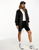 Rains waterproof hooded fishtail jacket in black