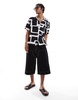 Bershka geometric patterned shirt in black