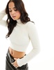 Bershka fluffy knit high neck sweater in beige