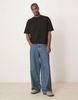ASOS DESIGN boxy oversized T-shirt with back sports graphic in black