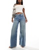 Bershka high waisted wide leg jeans in dirty mid blue wash