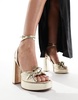 ASOS DESIGN Nikita knotted platform heeled sandals in gold