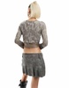 Reclaimed Vintage slash neck asymmetric hem top in gray