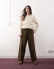 Monki utility jacket with zip off sleeves in beige