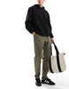 ASOS DESIGN tapered pull on chino with elastic waist in khaki
