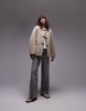 Mango contrast detail collarless faux shearling jacket in ecru