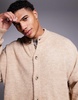 ASOS DESIGN oversized boxy fit knit crew neck cardigan with pockets in beige