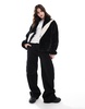 Nike faux fur Swoosh jacket in black