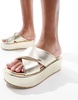 ASOS DESIGN Thunder padded cross strap flatform sandals in gold
