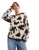 ASOS DESIGN fluffy knitted sweater in cow print