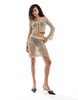ASOS DESIGN knit mini skirt in metallic yarn with crochet floral embellishment - part of a set