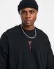 ASOS DESIGN oversized t-shirt in black with rose print