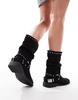 ASOS DESIGN Alara slouchy flat biker boots with hardware in black