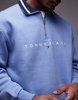 Tommy Jeans linear logo half zip sweatshirt in washed blue