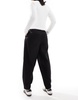 ASOS DESIGN button hem barrel tailored pants in black