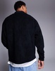 ASOS DESIGN oversized rugby polo fleece sweatshirt with quarter zip in black