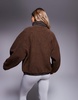 Weekend Collective nylon panel borg zip through fleece in brown
