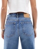 ASOS DESIGN Petite comfort stretch straight leg jeans in authentic dark mid blue