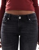 Bershka low rise flared jeans in black