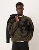 ASOS DESIGN relaxed boxy fit knit crew neck sweater with pattern in black