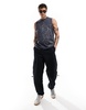 ASOS DESIGN relaxed tank top in black with grunge all over print