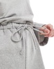 ASOS DESIGN long sleeve romper with channel waist and super shorts in gray