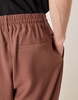 ASOS DESIGN loose fit smart pants with wide waistband and elasticated waist in brown