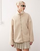 Monki long sleeve zip through fleece with contrasting trims in off white with pink floral lining